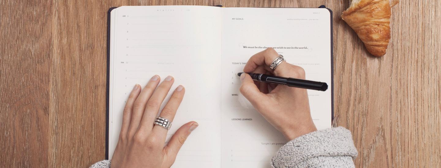 professional_development_plan_news_and_announcements_post.jpg Person writing in a notepad