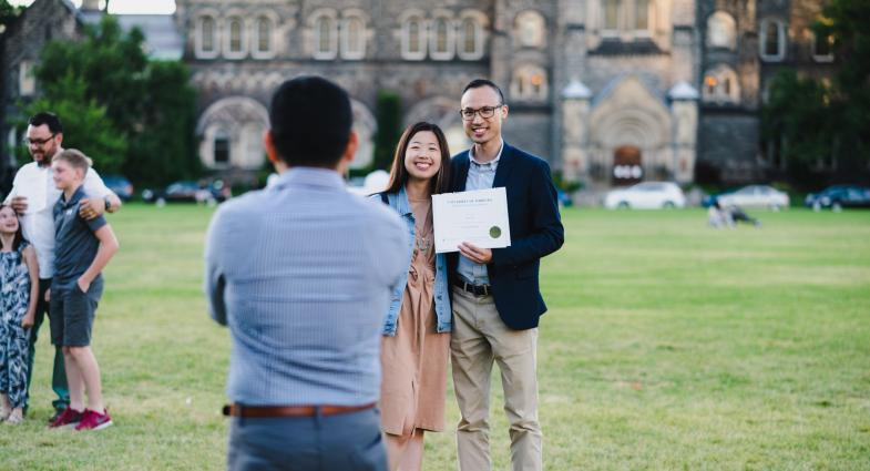 Student with Diploma