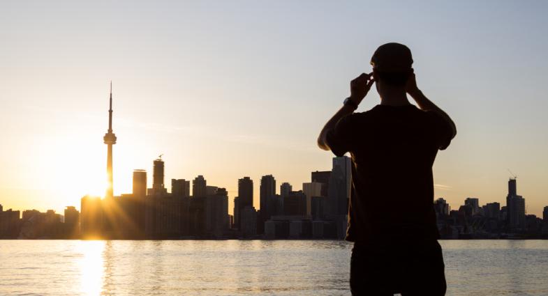 Person looking at Toronto skyline
